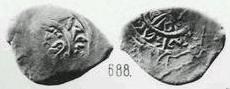 Монета Денга (человек с секирой влево, на обороте фигура, кольцевые надписи)