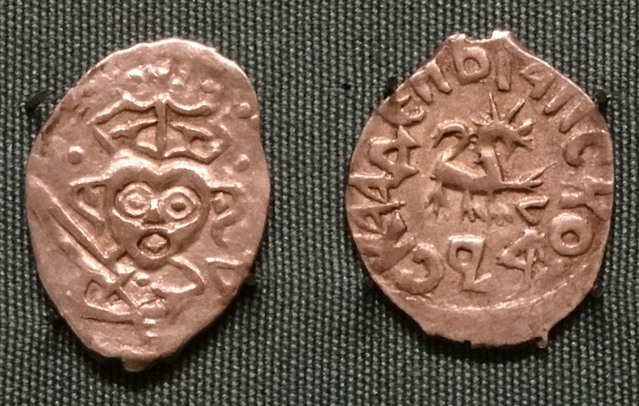 Монета Денга (князь Довмонт и буква Д, на обороте барс вправо и буква Л)