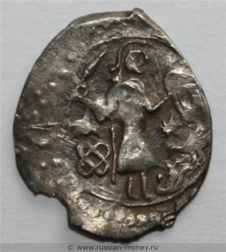 Монета Денга (человек с саблей вправо и тамга, на обороте надпись). Аверс